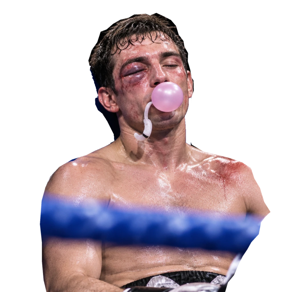Donnie rests between rounds, one eye swollen shut, mouthguard dangling, calmly blowing a perfect pink bubble.